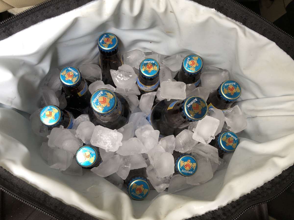 12 beer bottles iced down in AO Cooler 12 pack cooler.
