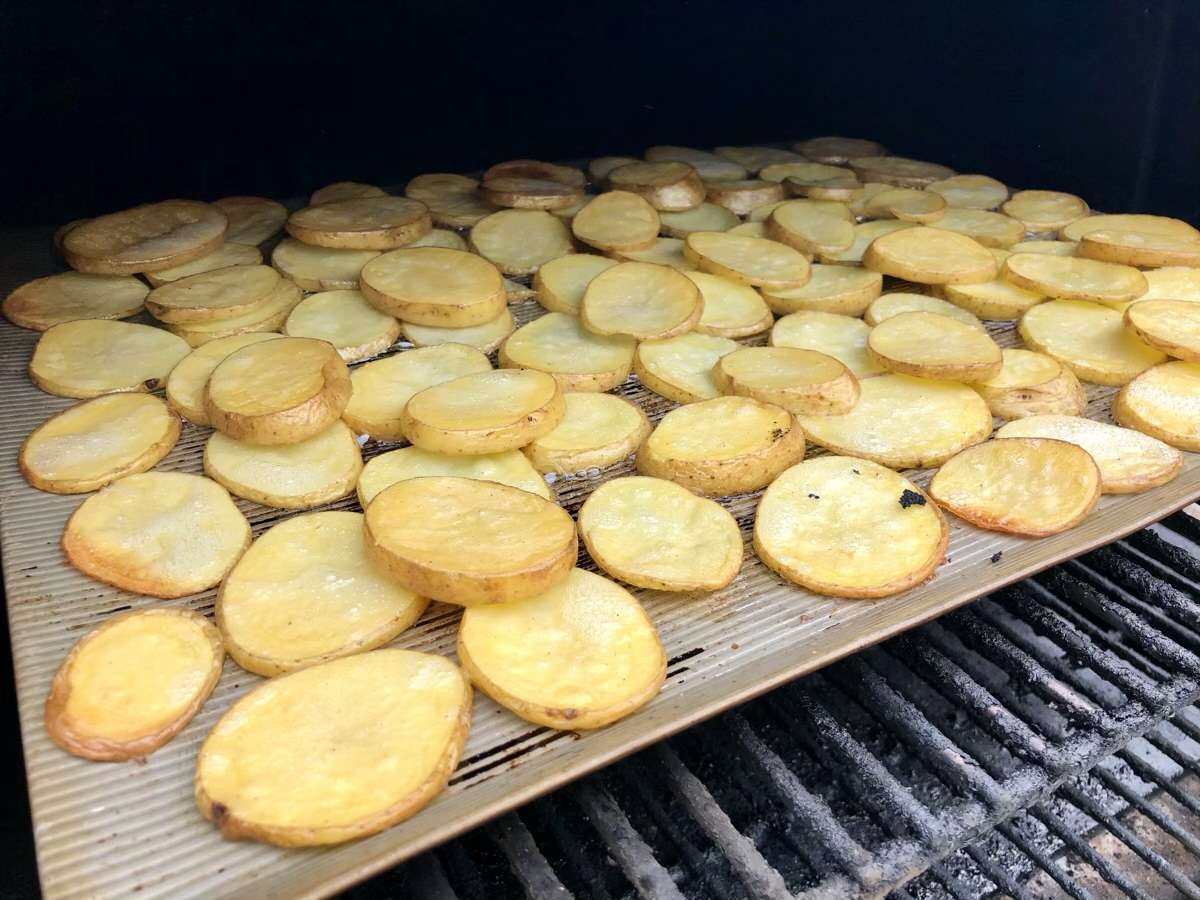 Potato rounds cooking on MAK 2 Star pellet grill