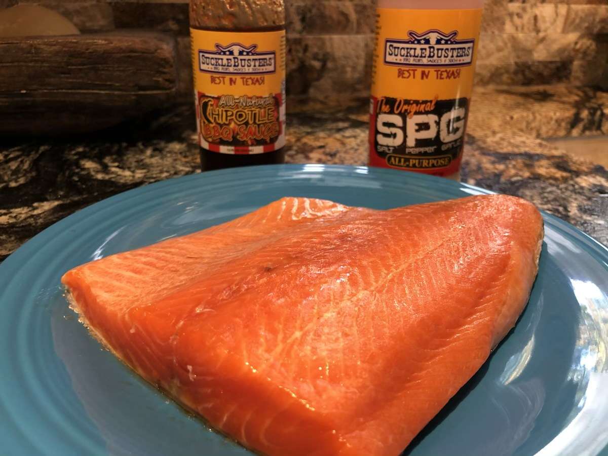 This simple cook features wild caught salmon with SuckleBusters SPG (salt, pepper, garlic) seasoning and SuckleBusters Chipotle BBQ Sauce to be used as a glaze.