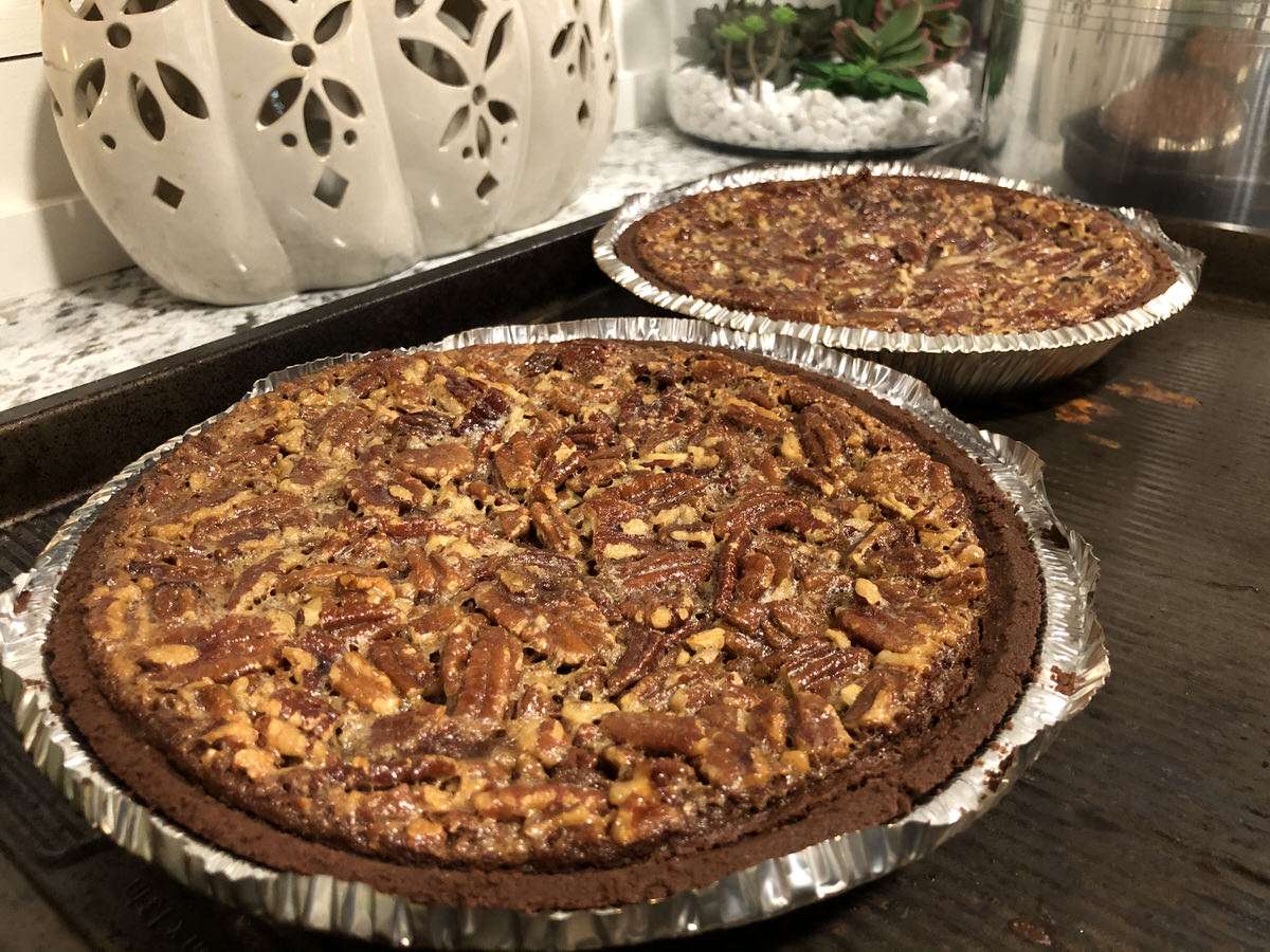Smoked pecan pies in a chocolate crust cooked to perfection on the MAK 2 Star pellet grill.