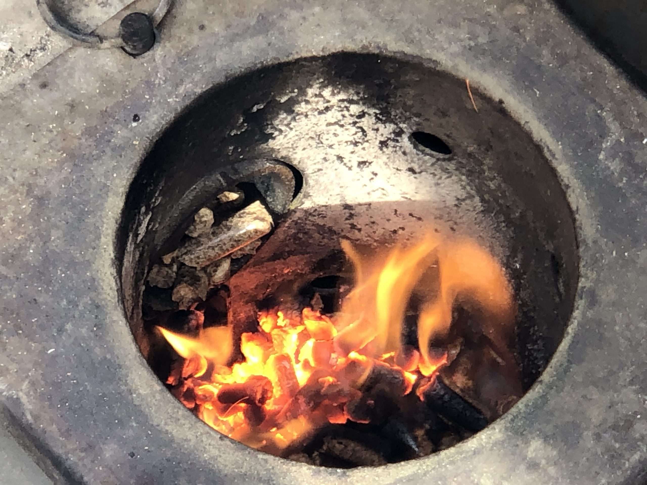 Wood pellet dumping in MAK 2 Star fire pot.