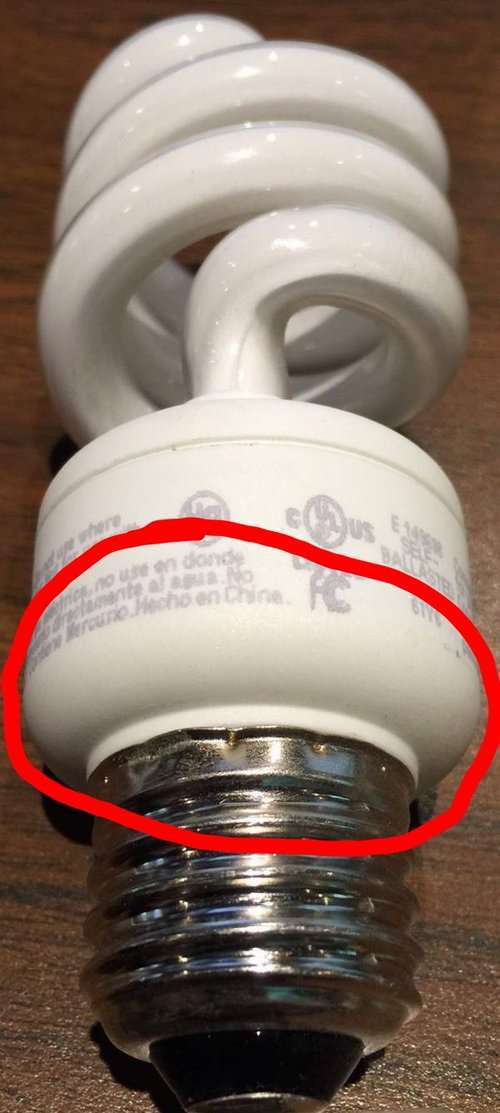Base is too wide on CFL light bulb... this prevents the bulb from making a good connection in the light socket