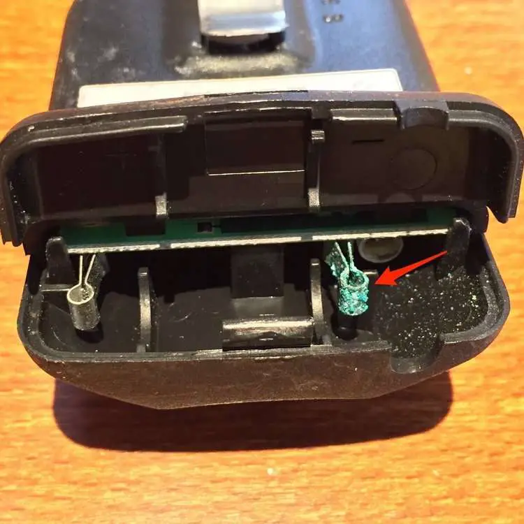 Corrosion on Genie remote battery contacts