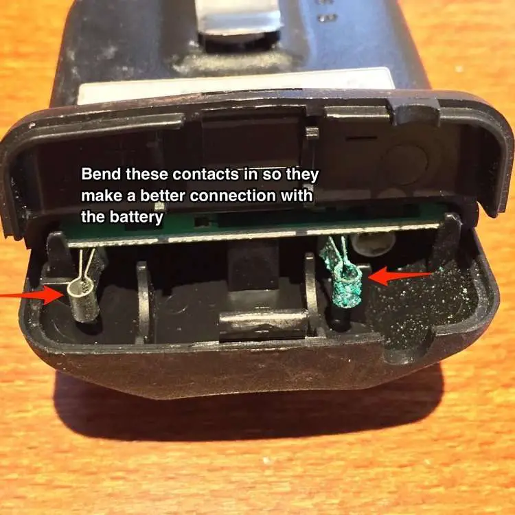 Bend these contacts in so they make a better connection with the battery