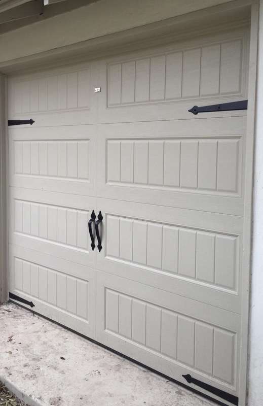 Long bead board garage door with magnetic spear hardware