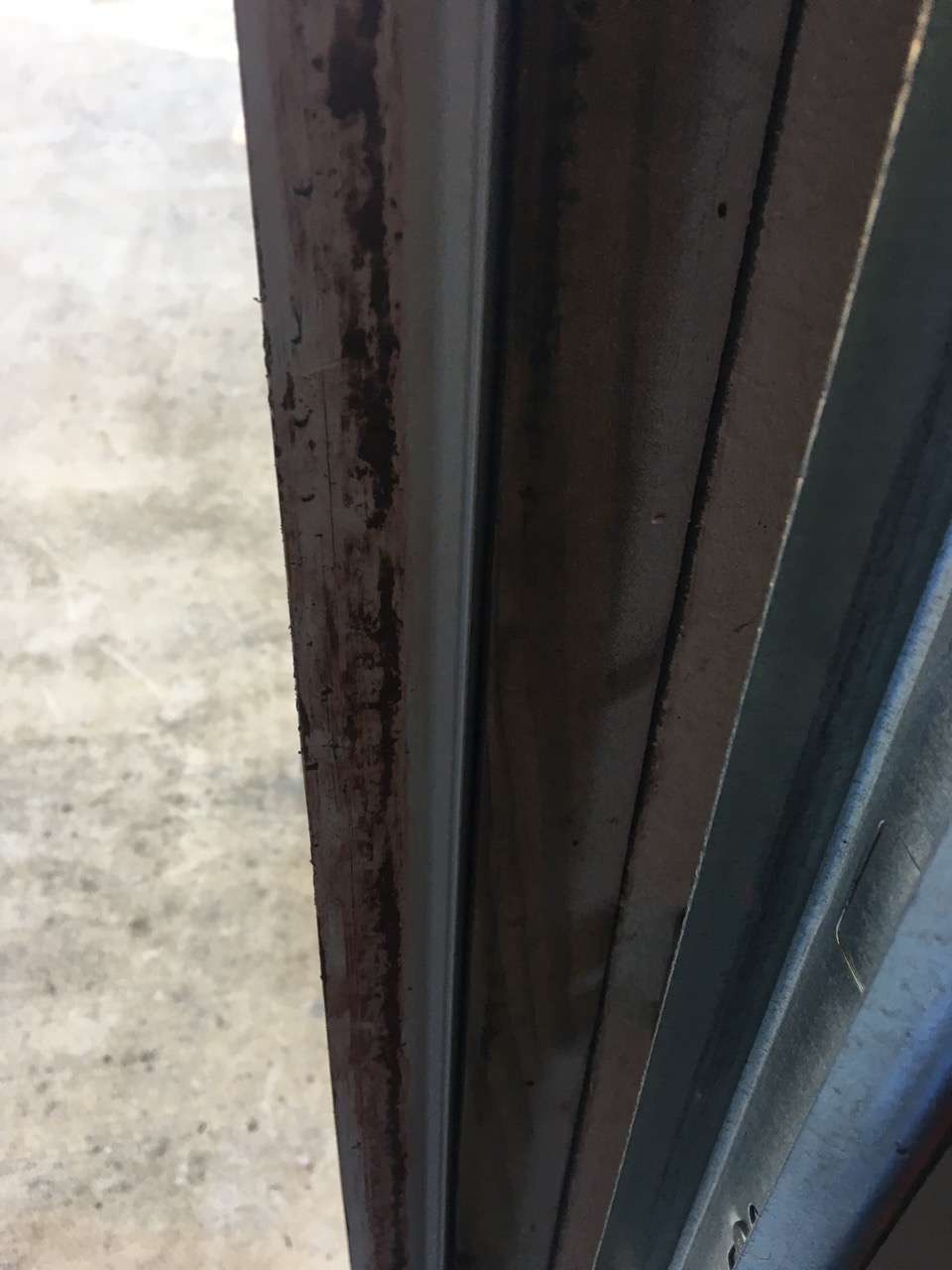 Paint on inside of garage door vinyl trim