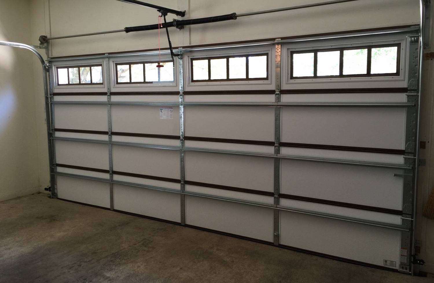 Vinyl back insulated garage door with full reinforcement struts installed.