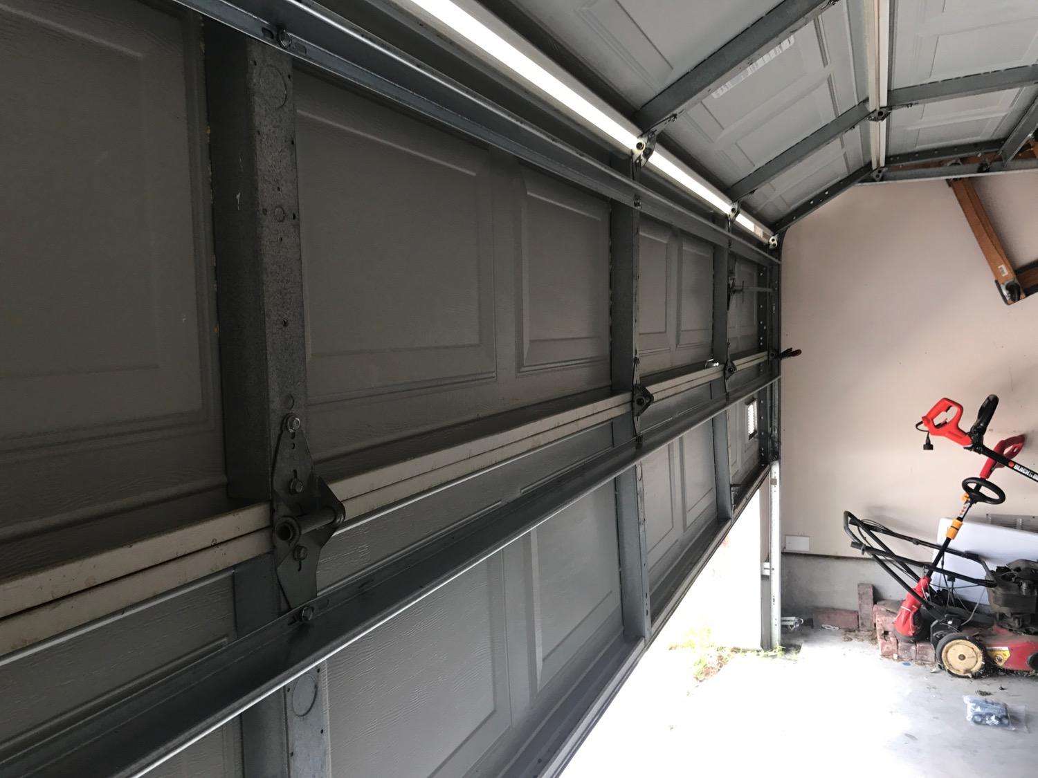 Here is another photo showing 16ft struts installed on the bottom and second sections of a double car garage door. As you can see they are installed at the top of the section.