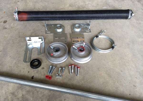 All the parts needed to convert a Wayne Dalton Torquemaster pring to a standard torsion spring.