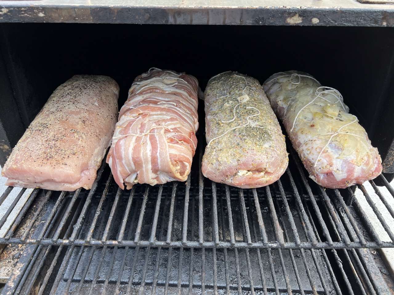 Four pork loins on top rack of MAK 2 Star pellet grill.