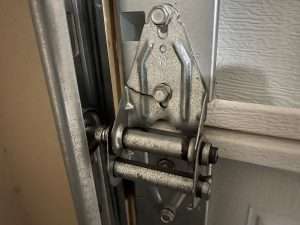 How To Repair a Garage Door Hinge