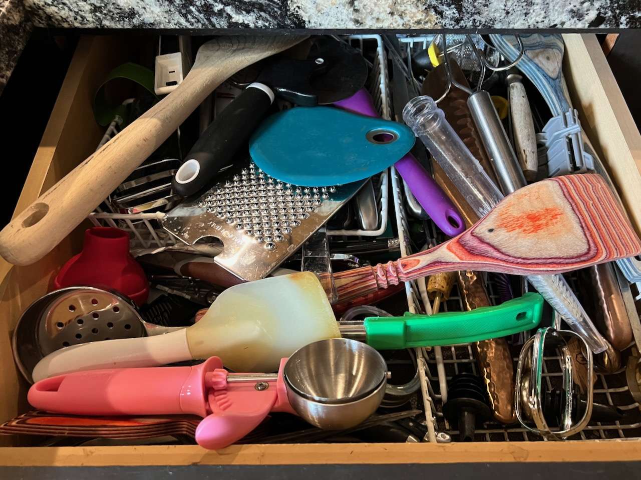Frustrating junk drawer in kitchen.