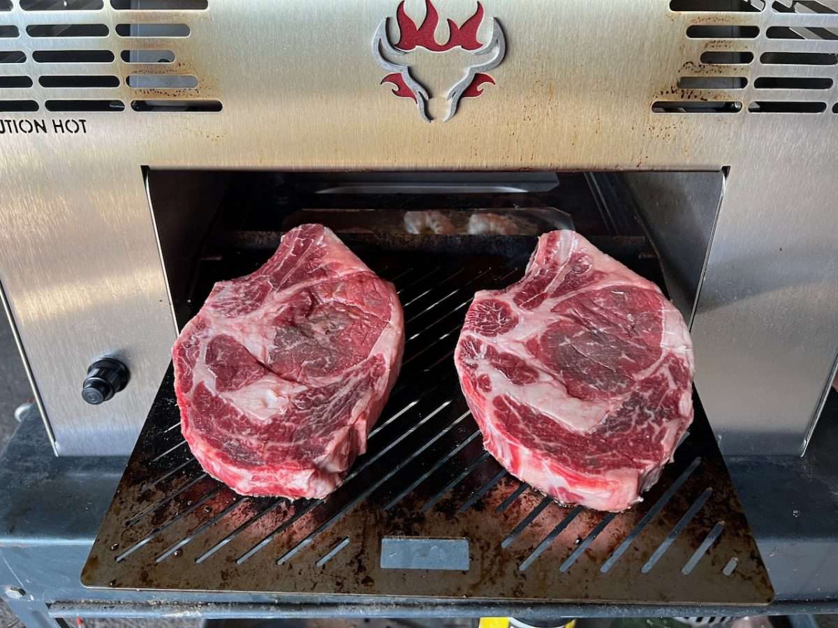 Beautifully marbled Prime bone-in ribeyes on Schwank Infrared Grill.