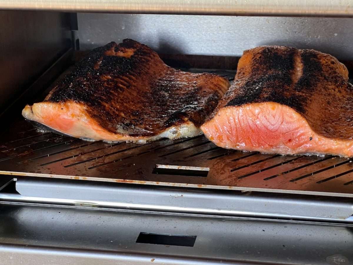 Salmon cooking at lowest height setting on Schwank Infrared Grill.