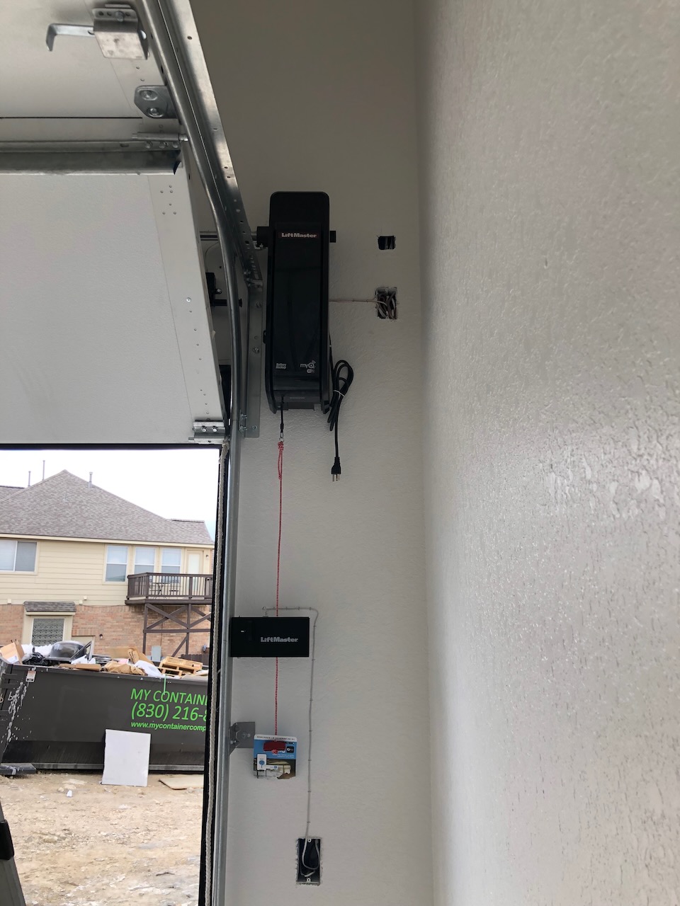As you can see there is plenty of room between the side wall and the garage door tracks for the installation of the LiftMaster 8500W wall mount opener.