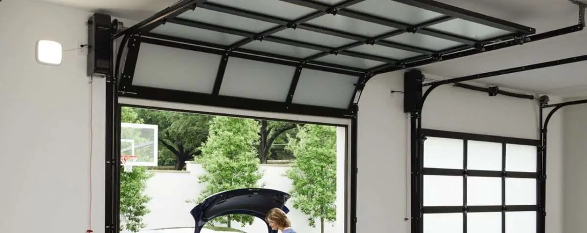 Two LiftMaster 98022 wall mount openers installed on glass garage doors. Screenshot credit: LiftMaster Product Guide