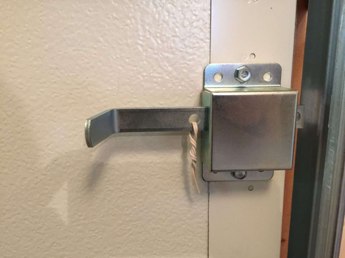 Inside slide lock on garage door. The lock has been disabled because the garage door had an automatic opener installed.