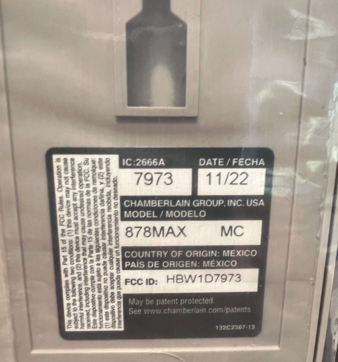 Back of LiftMaster 878MAX keypad which shows the date and model of the remote.