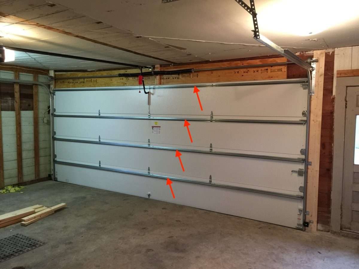 Full reinforcement struts installed on an 18ft wide steel back insulated garage door.