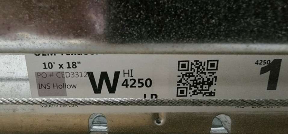 As you can see, this manufacturer (CHI Overhead Door) does not list the serial number for the garage door.