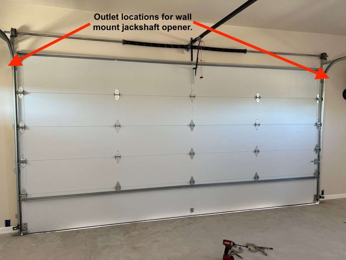 Outlet locations for wall mount jackshaft garage door opener.